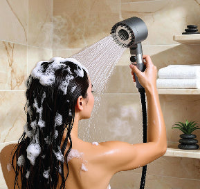 Woman enjoying ShowerFlowLuxe
